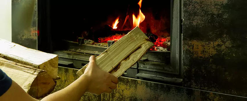 Wood Stove Heat Resistant Wall Repair in Longueuil, Quebec